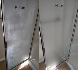 Beautifully restored shower glass door and side panel in the bathroom.